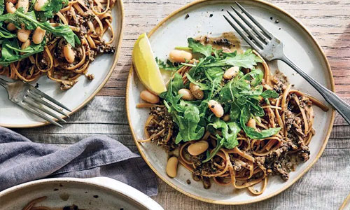 Mushroom Basil Linguine served fresh in a warm ceramic bowl